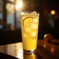 Refreshing Lemonade with Ice Cubes and Lemon Slice on Table photo