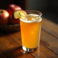 Serving of Apple Cider Drink with Apple Slice on a Wooden Table photo