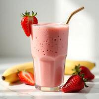 Making Strawberry Banana Smoothie with a Gold Straw photo