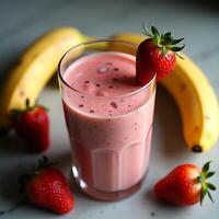 Drinking Strawberry Banana Smoothie with Fresh Fruit photo