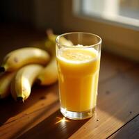 Enjoying Banana Juice Fresh Glass with Natural Light and Fruit photo