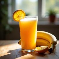 Fresh Orange Juice with Banana on Wooden Table in Sunlight photo