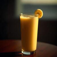 Banana Smoothie in Glass with Slice Garnish on Dark Table photo