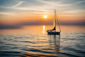 A sailboat is floating in the water at sunset photo