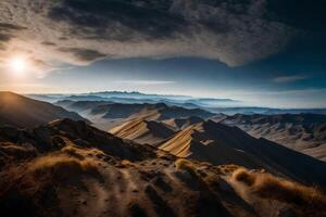 The sun shines over the mountains in this photo