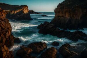 A rocky coastline with waves crashing against the rocks photo