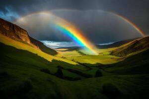 A rainbow is seen over a green valley photo