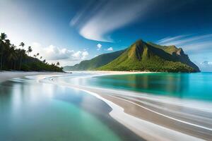 A beautiful beach with mountains and water photo