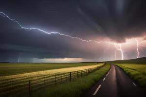 Lightning strikes over a road in the middle of a field photo