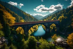 A train crossing a bridge over a river in the mountains photo