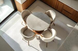 Elevated view of a modern dining set with a round table. photo