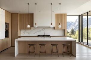 Modern kitchen with island and mountain view. photo