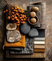 Muted tones fabric swatches and stones display. photo