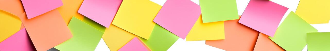 A collection of colorful sticky notes arranged in a close-up view. photo