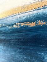 Abstract painting with horizontal color gradients and gold accents. photo
