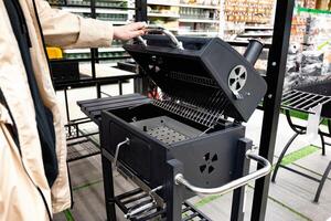 Outdoor modern black grill on display in a retail store. photo