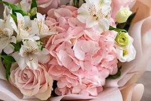 Beautiful bouquet arranged elegantly for a special occasion in a cozy setting photo