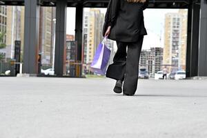 Woman while standing on a street in a residential area. photo
