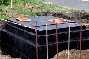 Foundation Bricks Prepared for Building in a Rural Area During Daytime photo