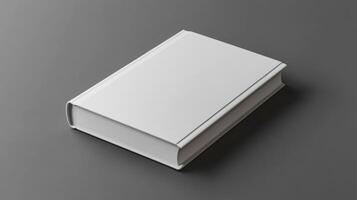 Minimalist white book resting on a gray surface inviting creativity and imagination in a serene atmosphere photo