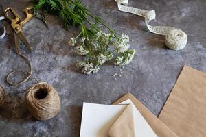 The background is a soft, light gray fabric that provides a subtle contrast to the white elements. photo