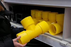 pipe fitting while shopping in home improvement store aisle during daytime photo