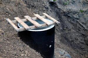 Foundation Blocks and Bricks Prepared for Building in a Rural Area During Daytime photo