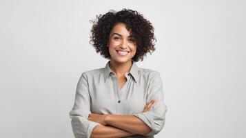 Smiling african american woman with arms crossed standing in front of white background photo
