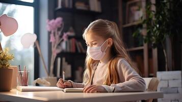 A girl in a medical mask is writing on a notebook photo