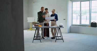 Designer's work with clients. Coordination of the project with a married couple photo