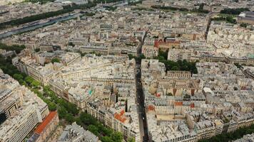 Top view of traditional and modern houses in the historic center of Paris. Residential quarters of the city from a bird's eye view. France, Paris, drone photo