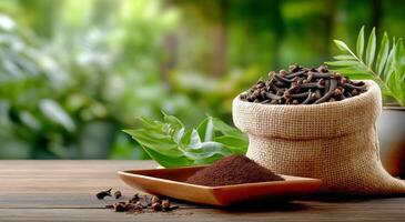 Cloves and Spice Powder Displayed in a Rustic Setting With Greenery in the Background photo