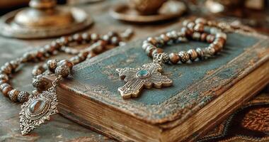 Religious Artifacts Displayed on a Wooden Table in a Serene, Atmospheric Setting photo