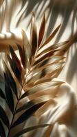 Elegantly Lit Palm Leaves Cast Dramatic Shadows on a Textured Fabric Surface in Soft Light photo