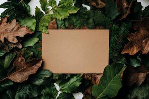 Natural Backdrop Featuring Leaves and a Blank Card for Creative Presentation Ideas photo