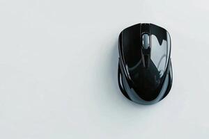 Unique Wooden Design of a Computer Mouse Resting on a Gray Background in a Minimalistic Setting. photo