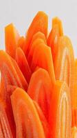 Vibrant Orange Carrot Slices Stacked Artistically for Culinary Presentation. photo