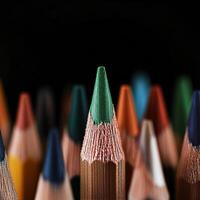 Colorful Pencil Tips Arranged in a Striking Display on a Black Background. photo