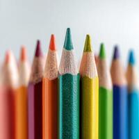 Colorful Pencils Arranged in a Row Highlighting Vibrant Hues and Fine Tips for Artistic Expression. photo