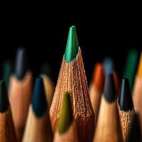 Colorful Pencil Tips Arranged in a Striking Display on a Black Background photo