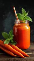 Freshly Squeezed Carrot Juice With Mint and Carrots on a Wooden Table. photo