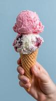 Enjoying a Delicious Two-Scoop Ice Cream Cone in Pastel Colors With a Light Background photo