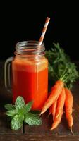 Freshly Squeezed Carrot Juice With Mint and Carrots on a Wooden Table photo
