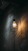 Elegant Hanging Light Fixture Adds Warmth to Modern Interior Space. photo