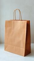 Brown Paper Bag on Wooden Surface With Empty Background for Packaging and Shopping Purposes. photo
