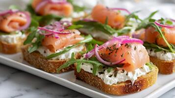 Delicious Smoked Salmon Toasts With Cream Cheese and Arugula on a Serving Platter photo