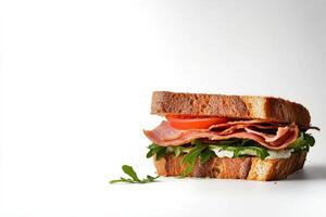 Delicious Sandwich With Ham, Tomato, and Arugula on Whole Grain Bread photo
