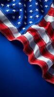 American Flag Draped Elegantly Against a Blue Backdrop Displaying Rich Colors and Textures photo