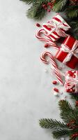 Holiday Gift Arrangement With Ornaments and Candy Canes on a Light Background. photo