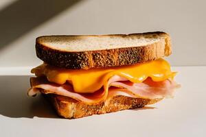 Delicious Ham and Cheese Sandwich on Rustic Bread With Melted Cheddar. photo